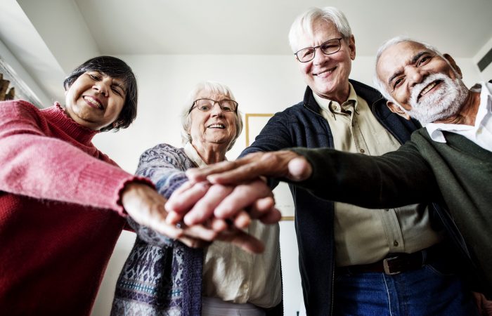 Group of senior friends support concept