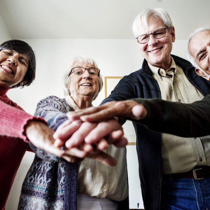 Group of senior friends support concept