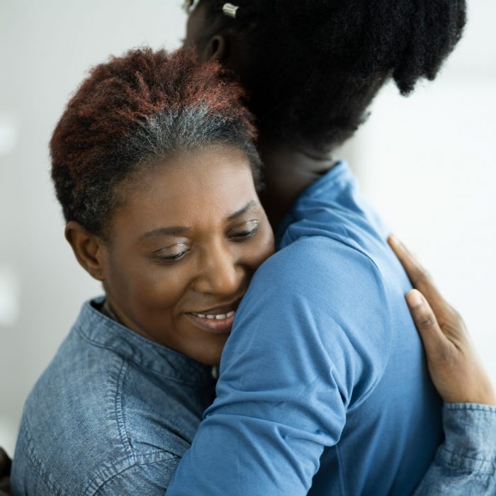 African Teen Support For Elderly Mature Mother