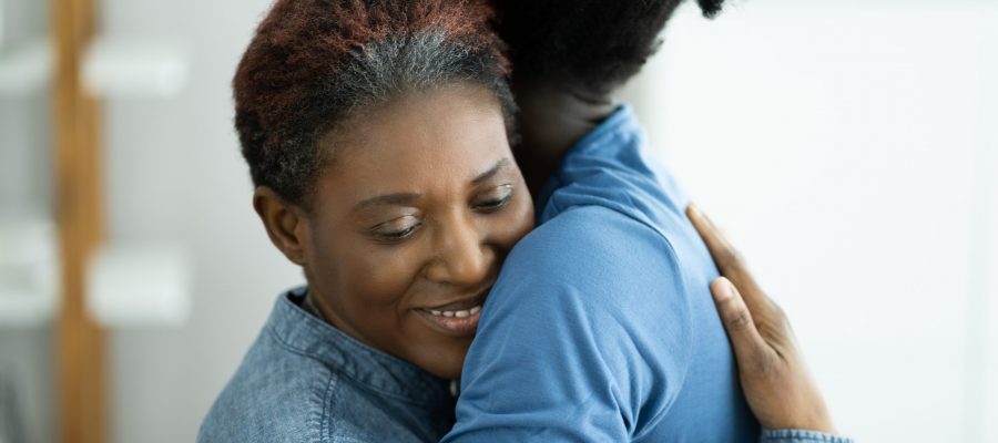 African Teen Support For Elderly Mature Mother